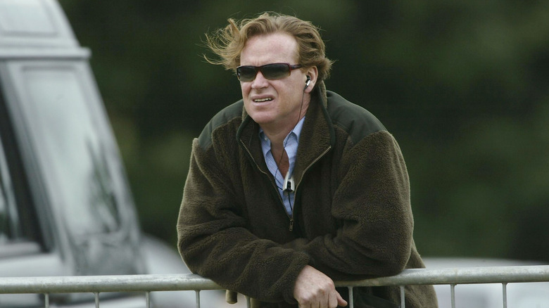 James Hewitt standing outside