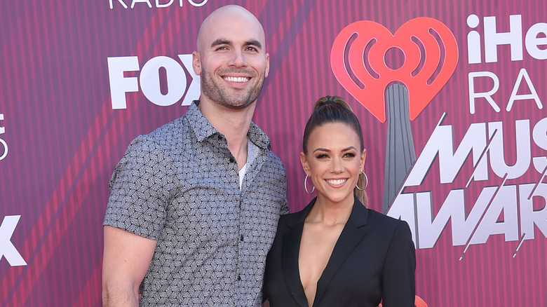 Mike Caussin and Jana Kramer posing