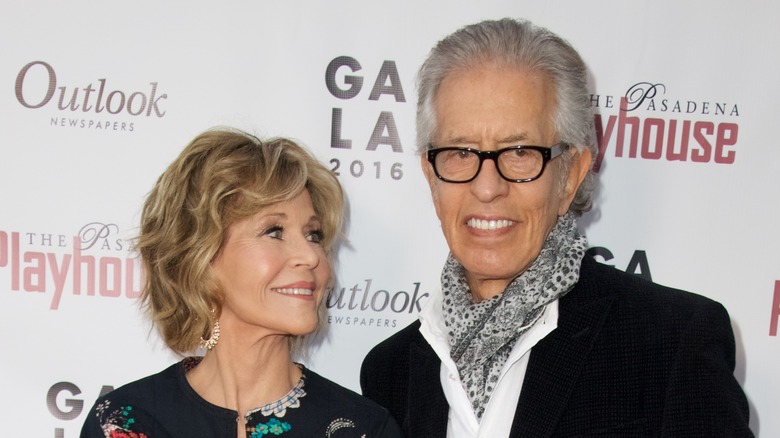 Jane Fonda standing next to Richard Perry