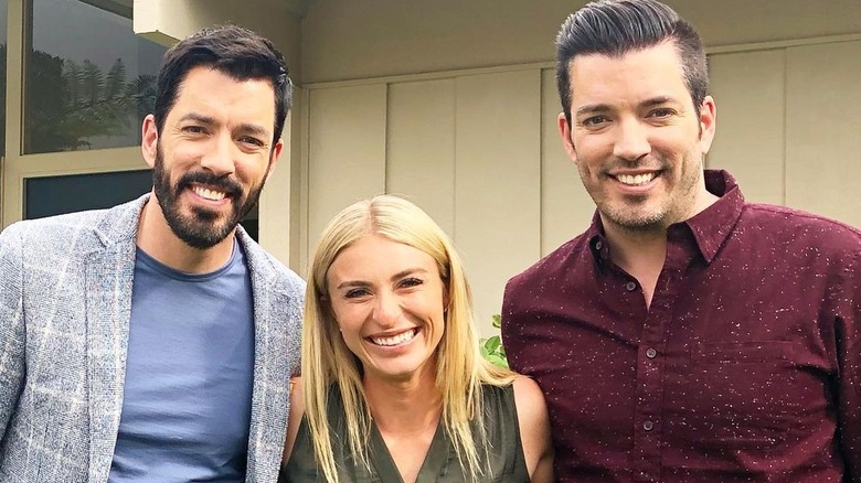 Jasmine Roth smiling with the Property Brothers