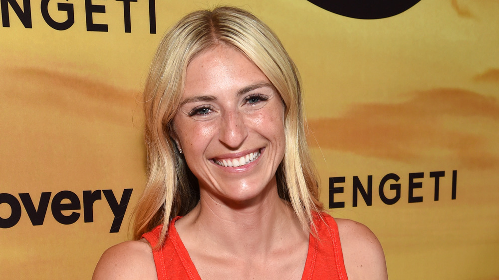 Jasmine Roth smiling on a red carpet