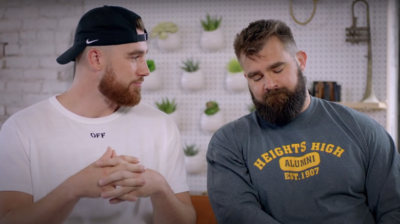 Travis Kelce and Jason Kelce sitting next to each other