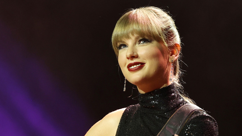 Taylor Swift smiling onstage