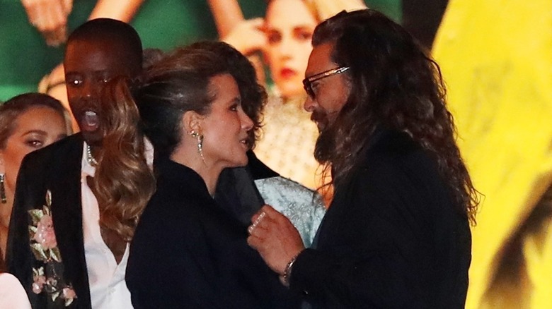 Jason Momoa and Kate Beckinsale at a party