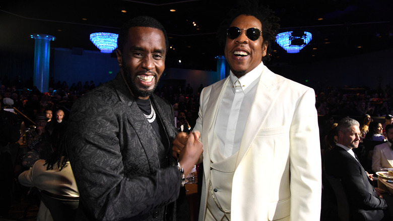 Jay-Z and Diddy posing for photos