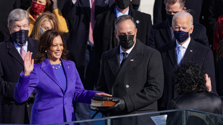 Kamala Harris being sworn-in as Vice President alongside Doug Emhoff and Joe Biden