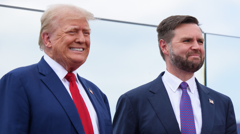 Donald Trump and JD Vance smiling