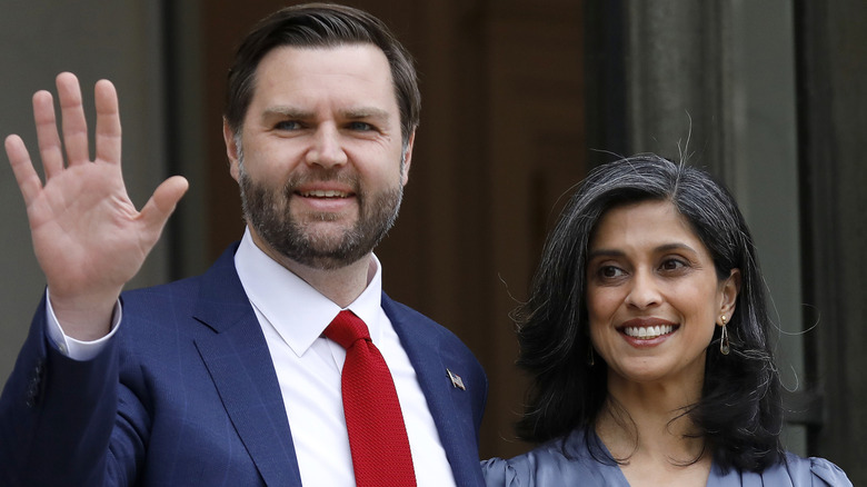 JD Vance waving next to Usha Vance