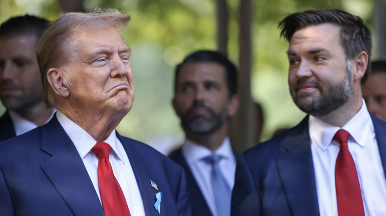 JD Vance smiling at Donald Trump