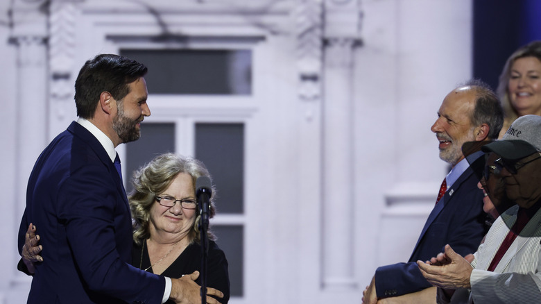 Beverly Aikins hugs son JD Vance at the RNC in 2024