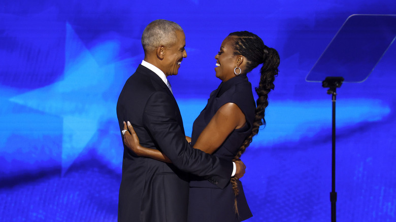 Barack and Michelle Obama embracing