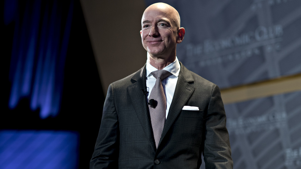 Jeff Bezos smiling on stage