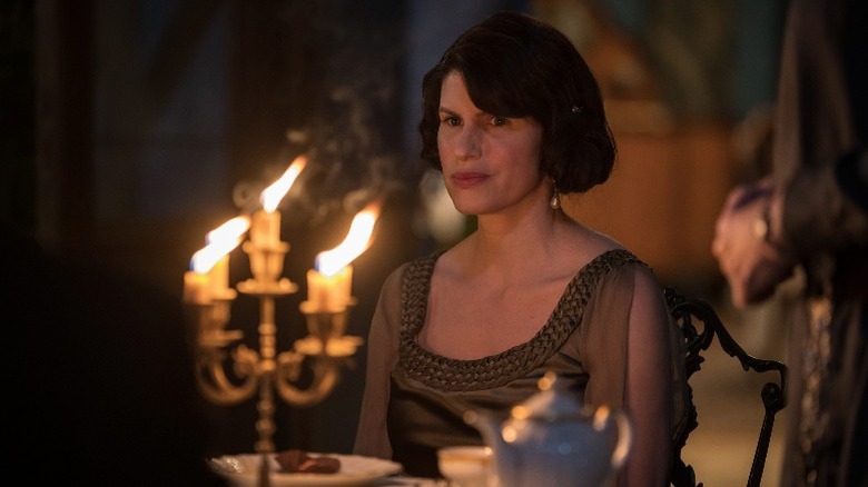 Jemima Rooper sitting at a table