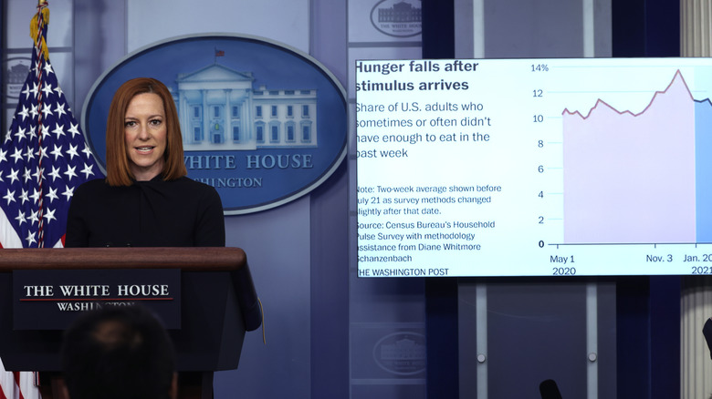 Jen Psaki presenting statistics related to stimulus