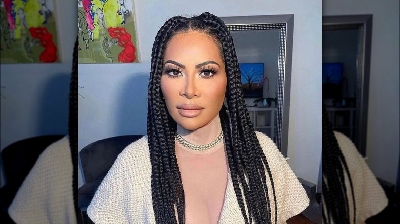 Jen Shah selfie with braids and full glam 