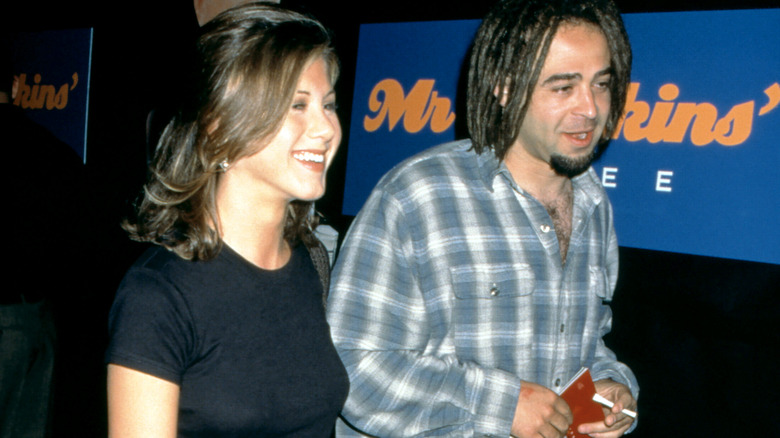 Jennifer Aniston and Adam Duritz smiling