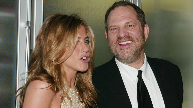 Jennifer Aniston and Harvey Weinstein attending an event