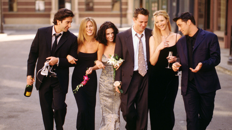 friends cast walking and laughing