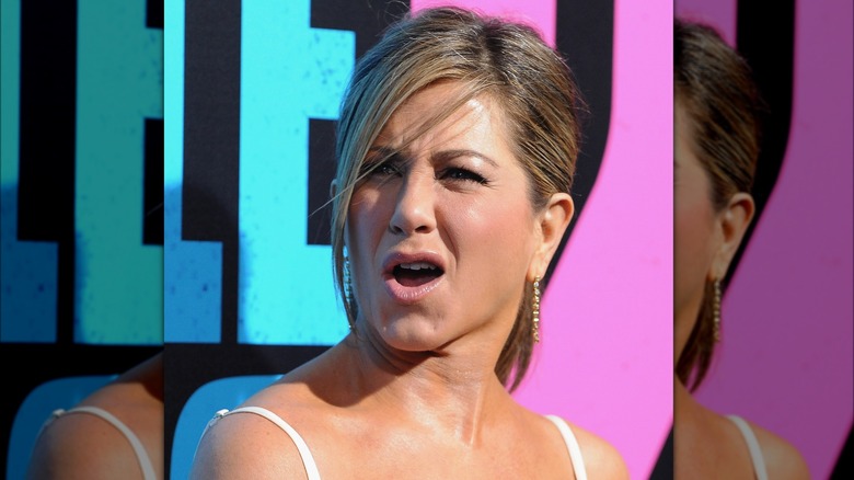 Actor Jennifer Aniston frowning