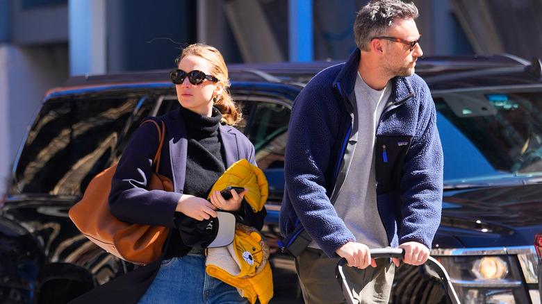 Jennifer Lawrence walking with husband 