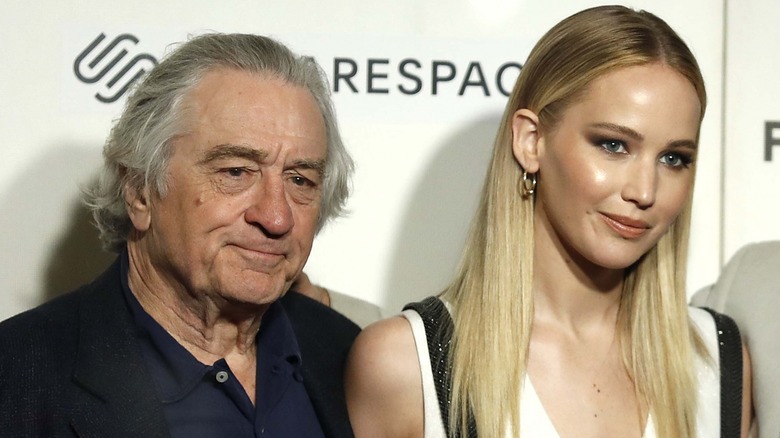 Jennifer Lawrence and Robert De Niro posing