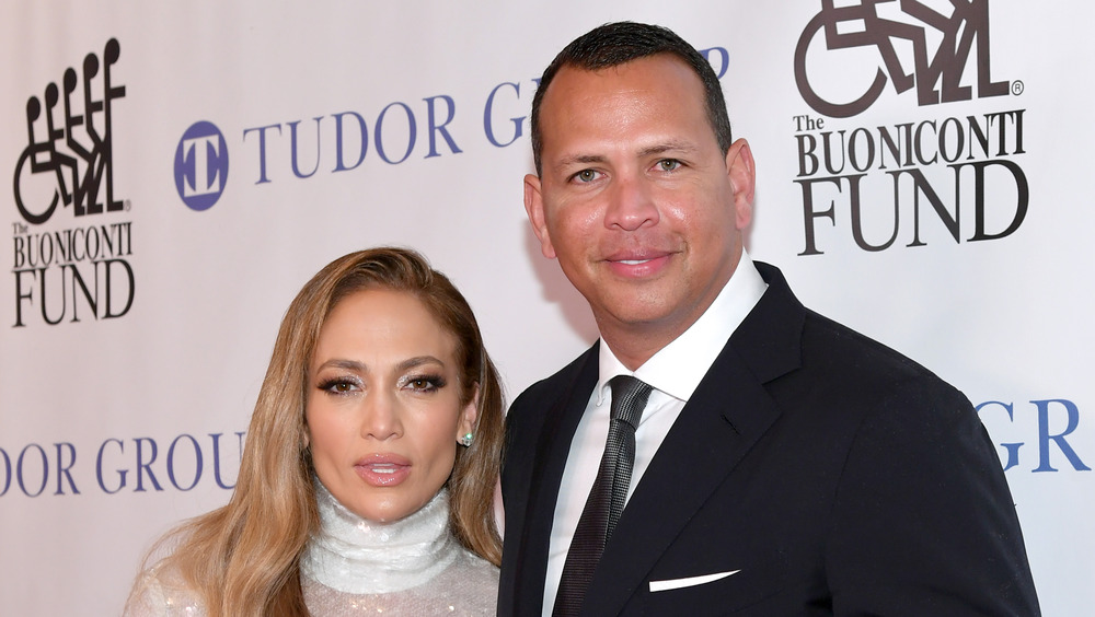 Alex Rodriguez and Jennifer Lopez posing at event