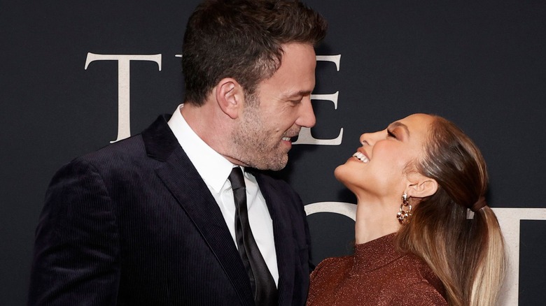 Jennifer Lopez and Ben Affleck smile at each other