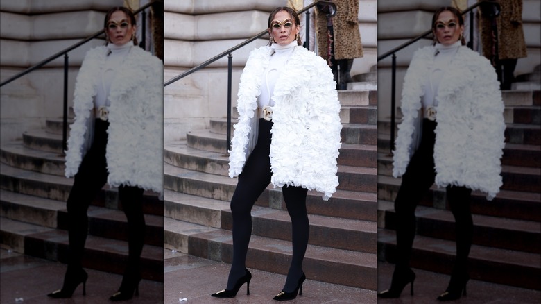 Jennifer Lopez posing at Paris Fashion Week in 2024