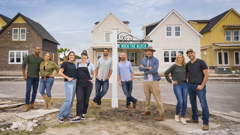 (L-R) Mike Jackson, Egypt Sherrod, Leslie Davis, Lyndsay Lamb, Evan Thomas, Keith Bynum, Ty Pennington, Jenny and Dave Marrs standing together