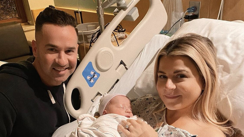 Mike and Lauren Sorrentino hold newborn son, Romeo, in the hospital