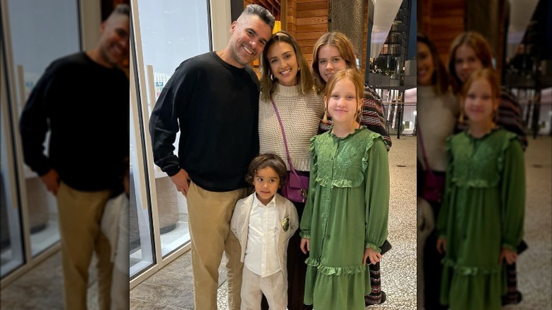 Jessica Alba and her family smiling