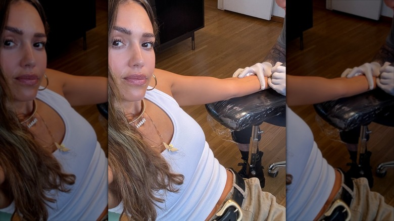 Jessica Alba getting a tattoo