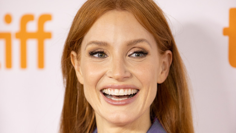 Jessica Chastain laughing at a press conference