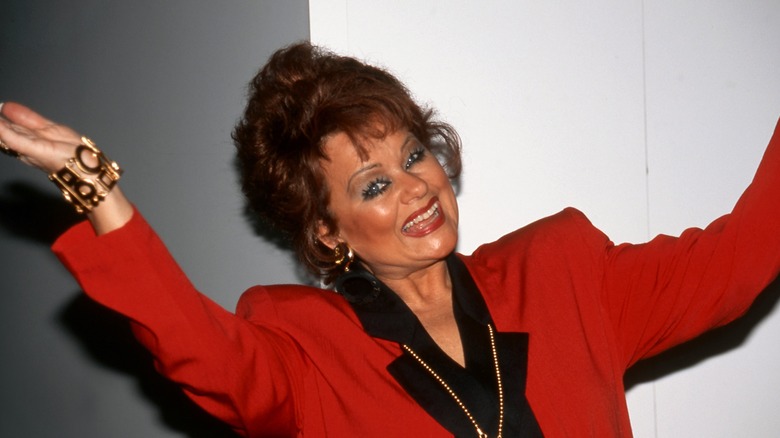 Tammy Faye Bakker posing for a photo in 1996