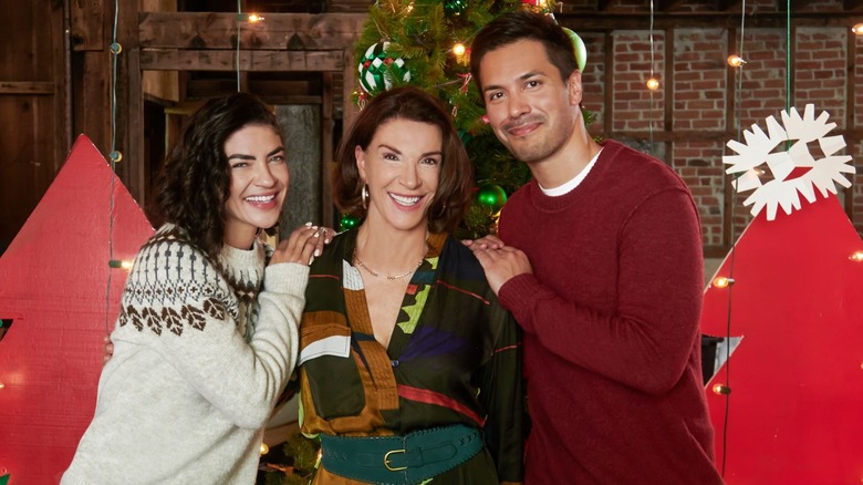 Jessica Szohr, Hilary Farr, and Marco Grazzini in "Designing Christmas"