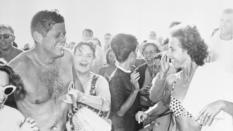 JFK in a crowd of women