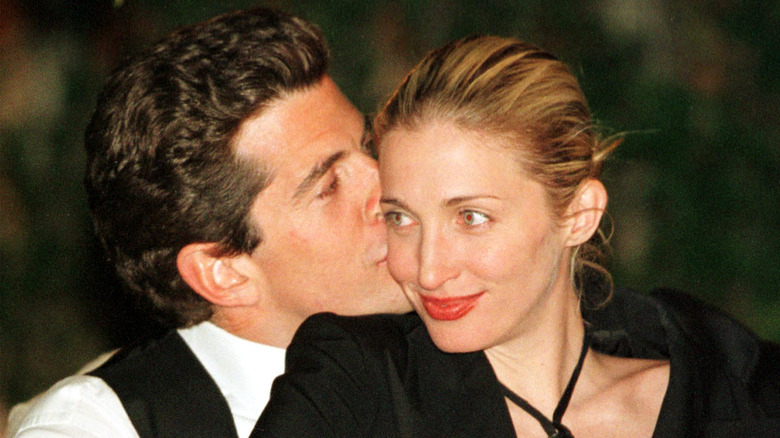 JFK Jr. kissing Carolyn Bessette on cheek