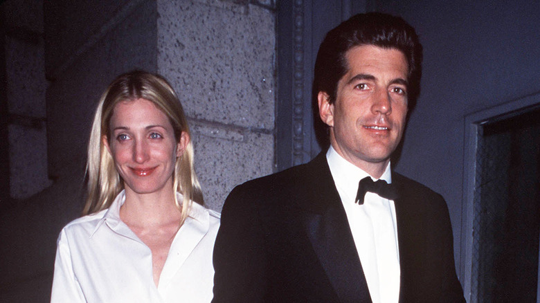 Carolyn Bessette and John F. Kennedy Jr. leaving building