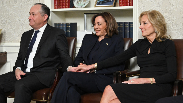 Doug Emhoff, Vice-President Kamala Harris and First Lady Jill Biden listen to US President Joe Biden (off frame) as he delivers his farewell address to the nation from the Oval Office of the White House on January 15, 2025