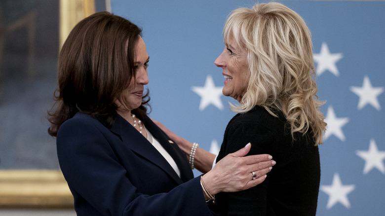 Kamala Harris talking to Jill Biden