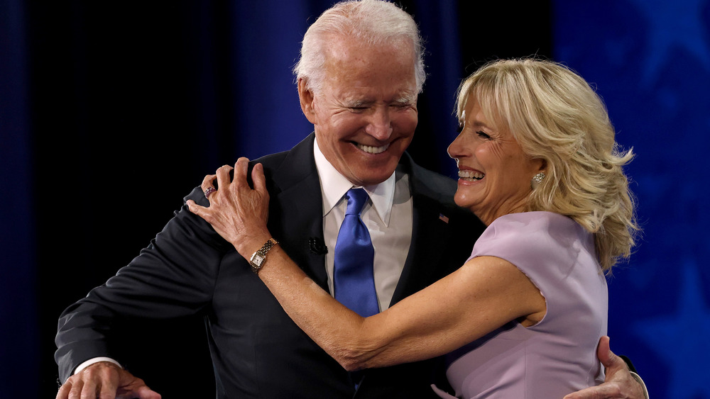 Joe Biden and Jill Biden embracing