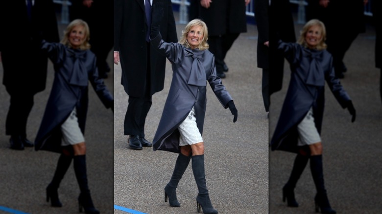 Jill Biden smiles and waves while walking