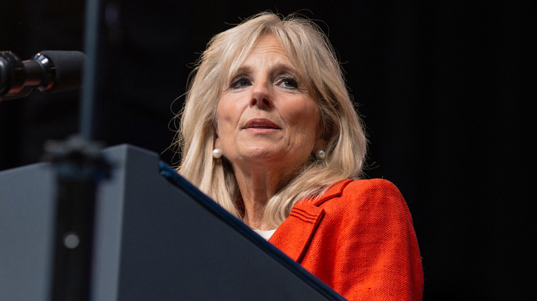 First Lady Jill Biden standing at a podium in 2016