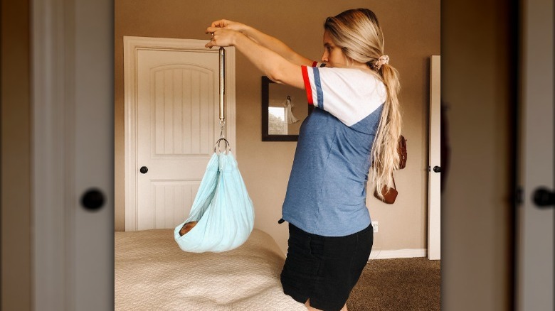 Jill Duggar weighing her son