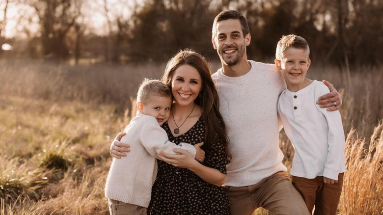 Jill and Derick Dillard posing with their kids