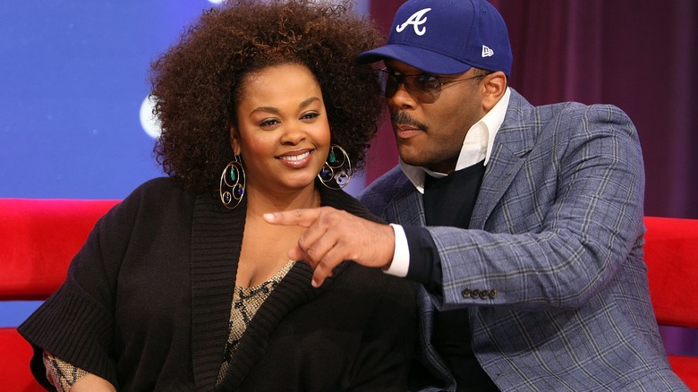 Jill Scott and Tyler Perry on a couch