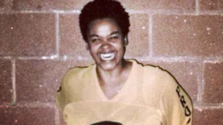 A young Jill Scott laughing