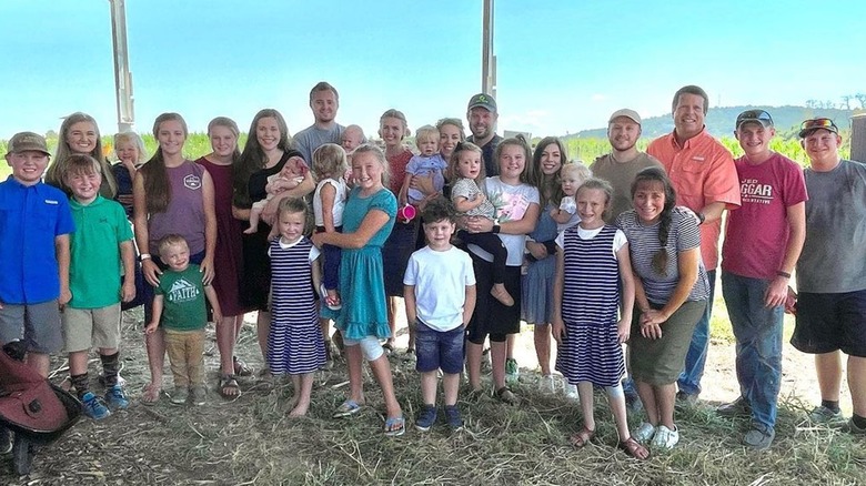 Duggar family and grandchildren at farm