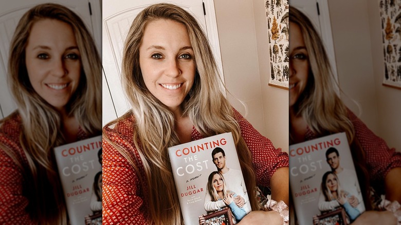 Jill Duggar Dillard with her book