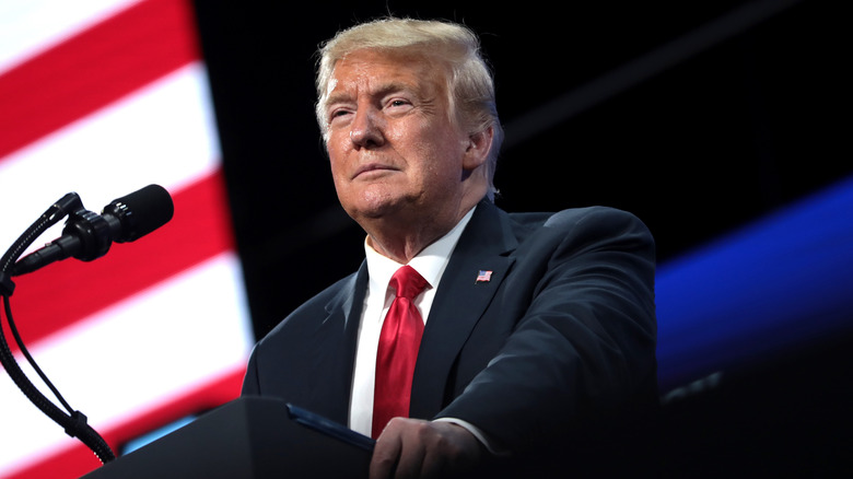 Donald Trump standing at podium